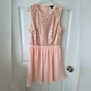 Girl's pink sleeveless dress with sequins